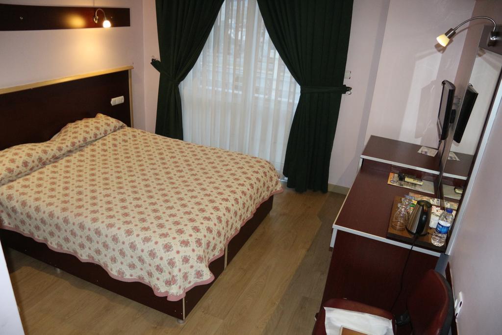 Metropolis Hotel Torbali Bagian luar foto
