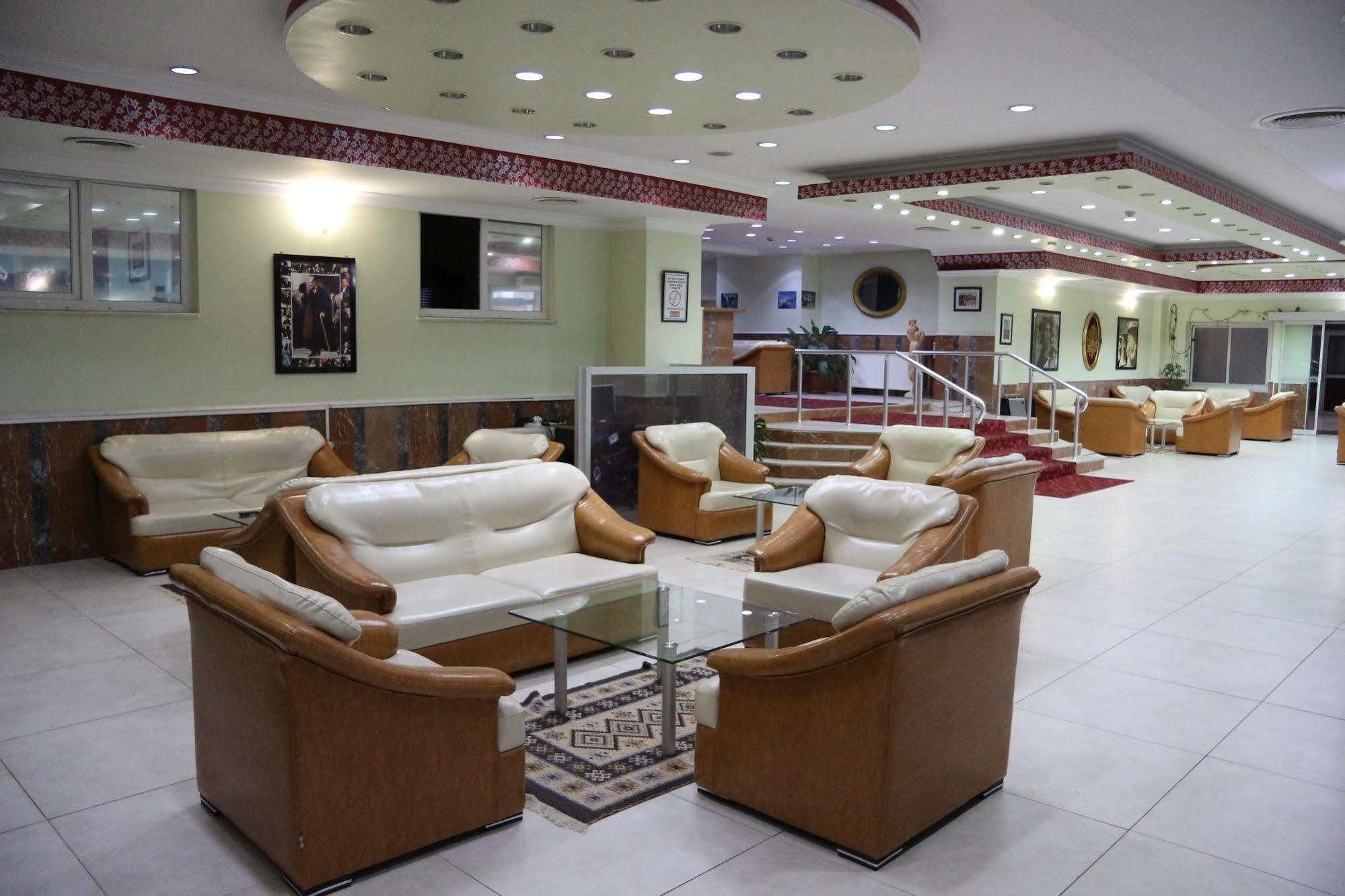 Metropolis Hotel Torbali Bagian luar foto