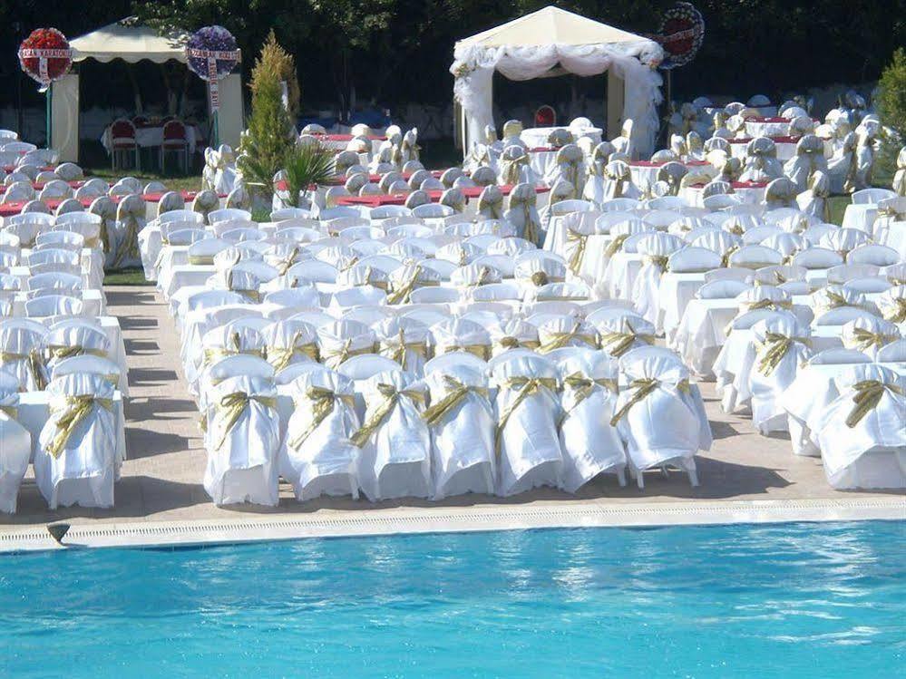 Metropolis Hotel Torbali Bagian luar foto
