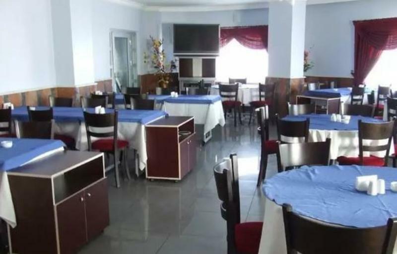 Metropolis Hotel Torbali Bagian luar foto